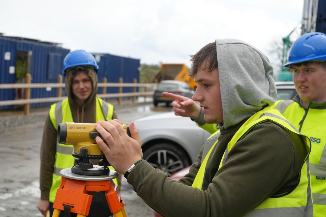 Students Alex Taggart and Dara Pucci with Connor Doherty Site Engineer, BSG Engineering.